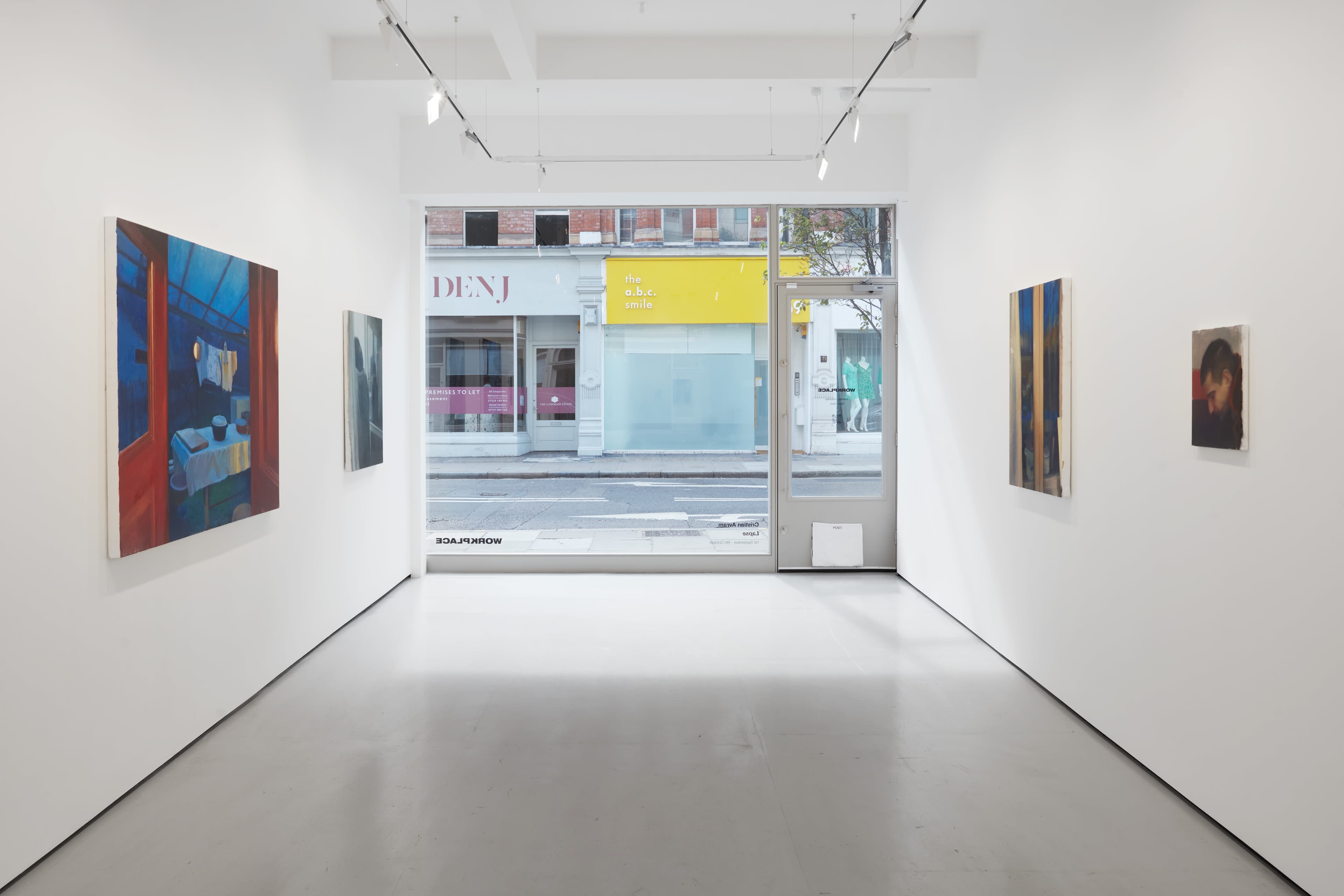 Installation shots of Cristian Avram's exhibition 'Lapse' at Workplace in London. An exhibition of oil paintings in a minimal white gallery space. 