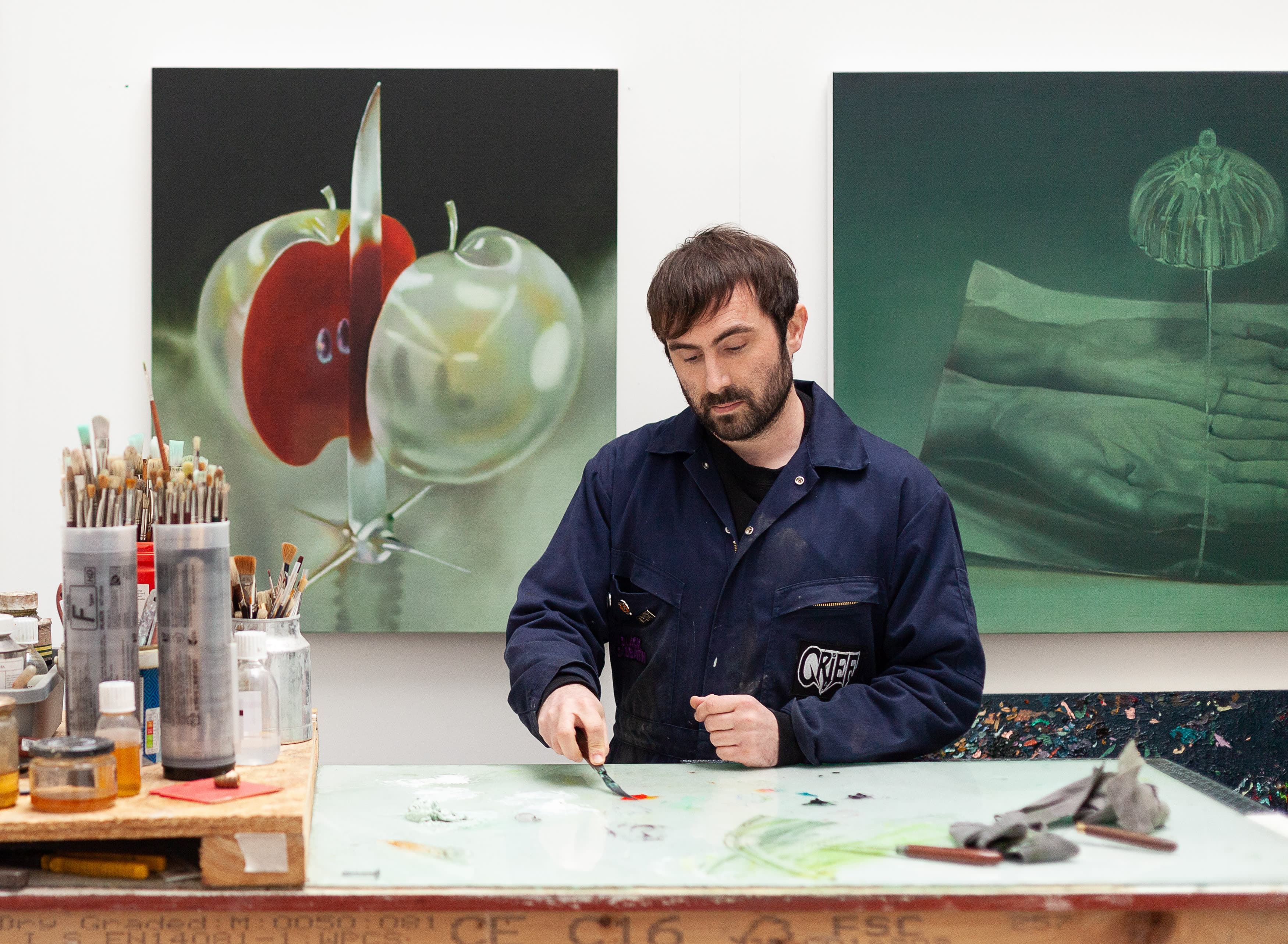 A portrait of Robin Megannity in his studio by John-Paul Brown