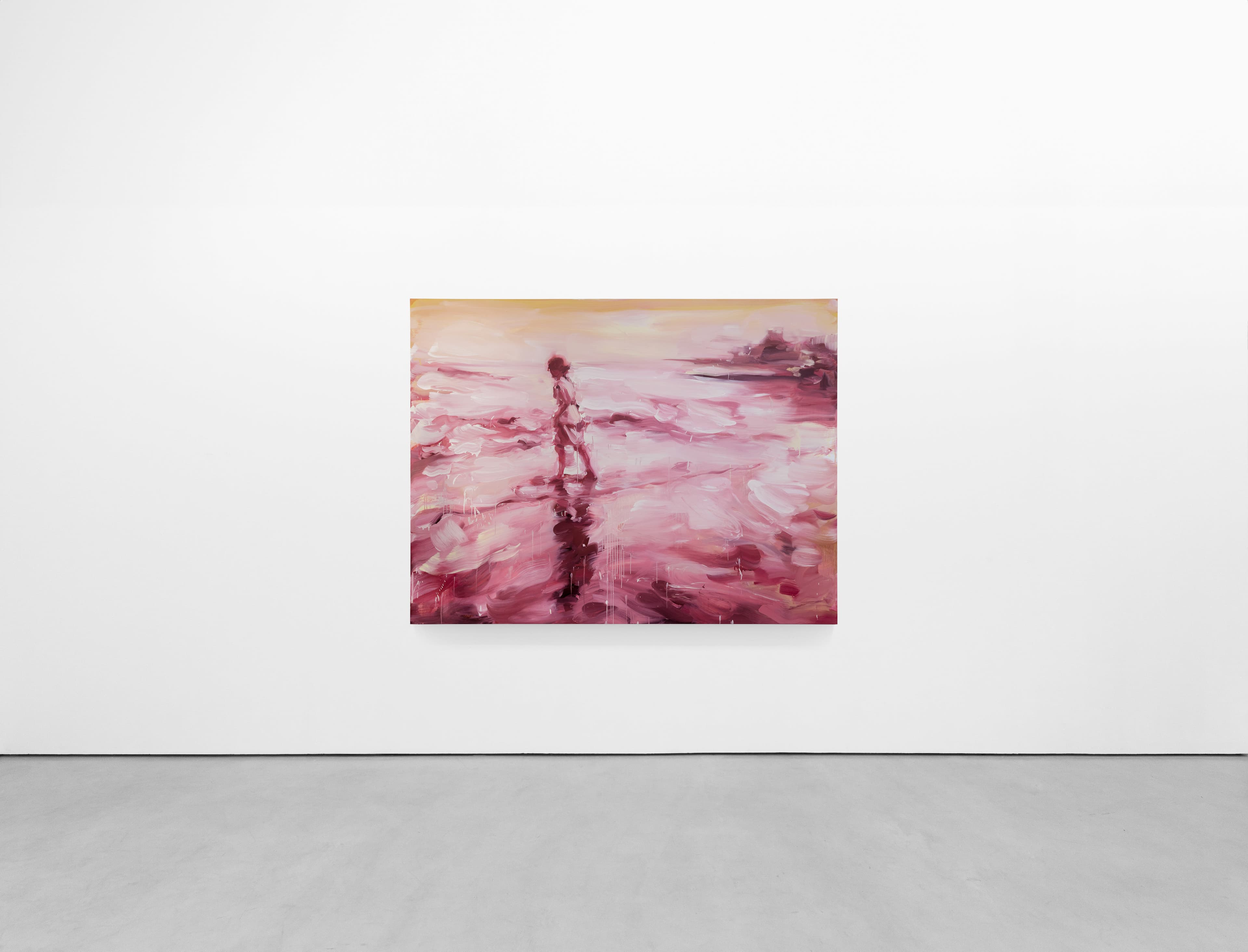 installation shot of a  loosely painted landscape painting by Laura Lancaster - a woman walks to the left across wet sand towards the sea, the coastline is visible in the top right hand corner. The scene is bathed in vibrant pinks and yellowshed  