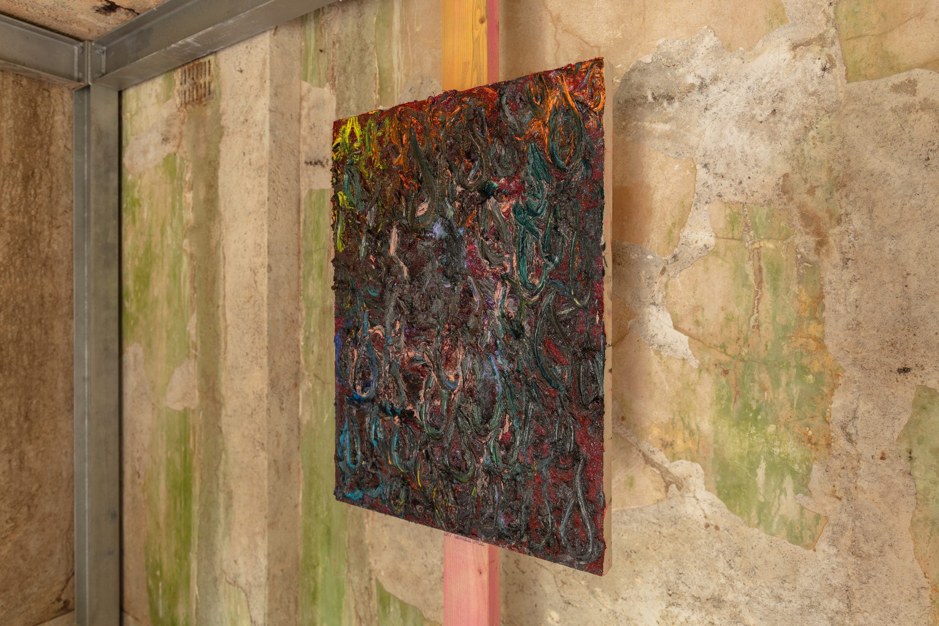 Artworks by James Cabaniuk installed outside in a lush green garden