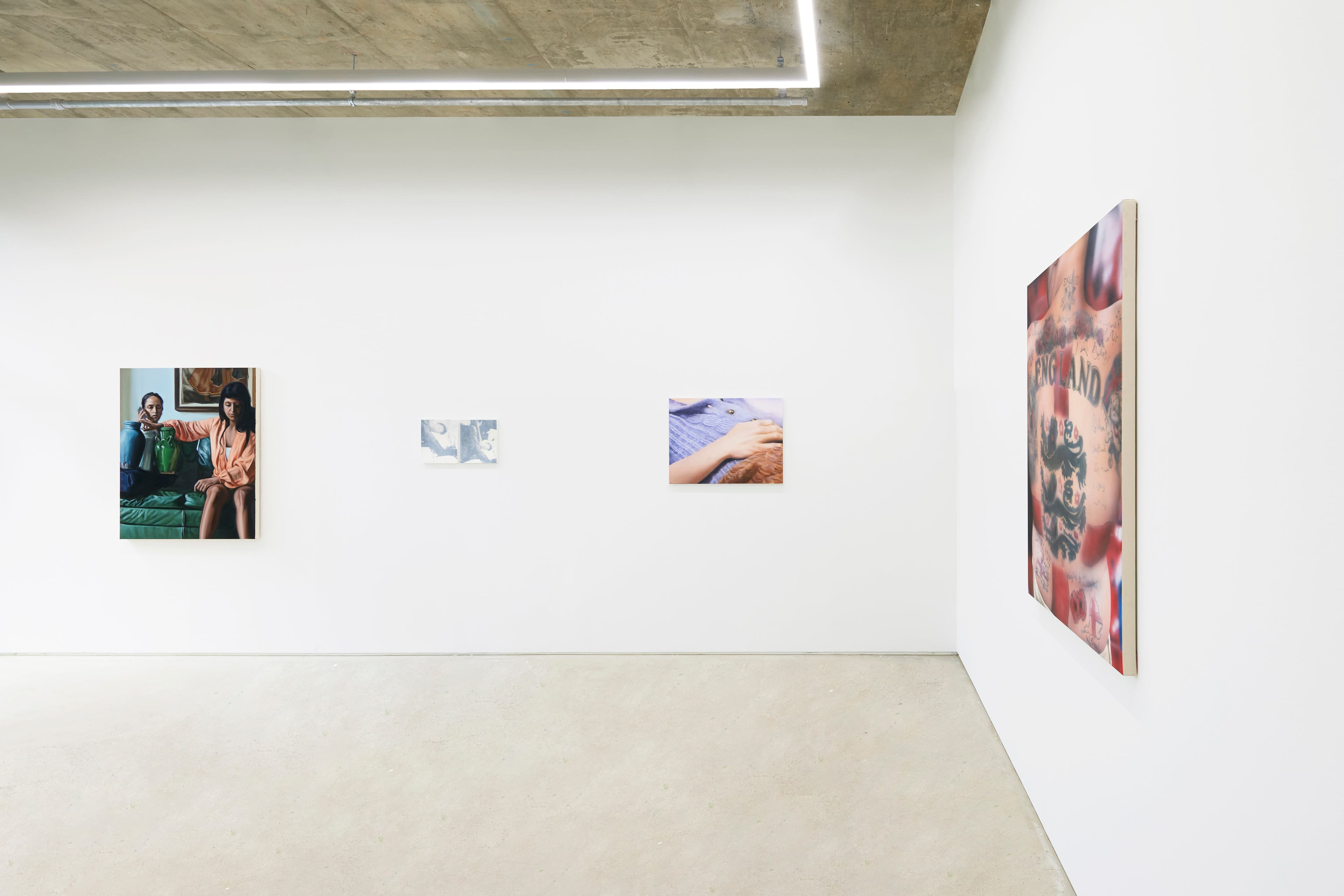 An installation view of a group painting exhibition including a painting by Rachel Lancaster