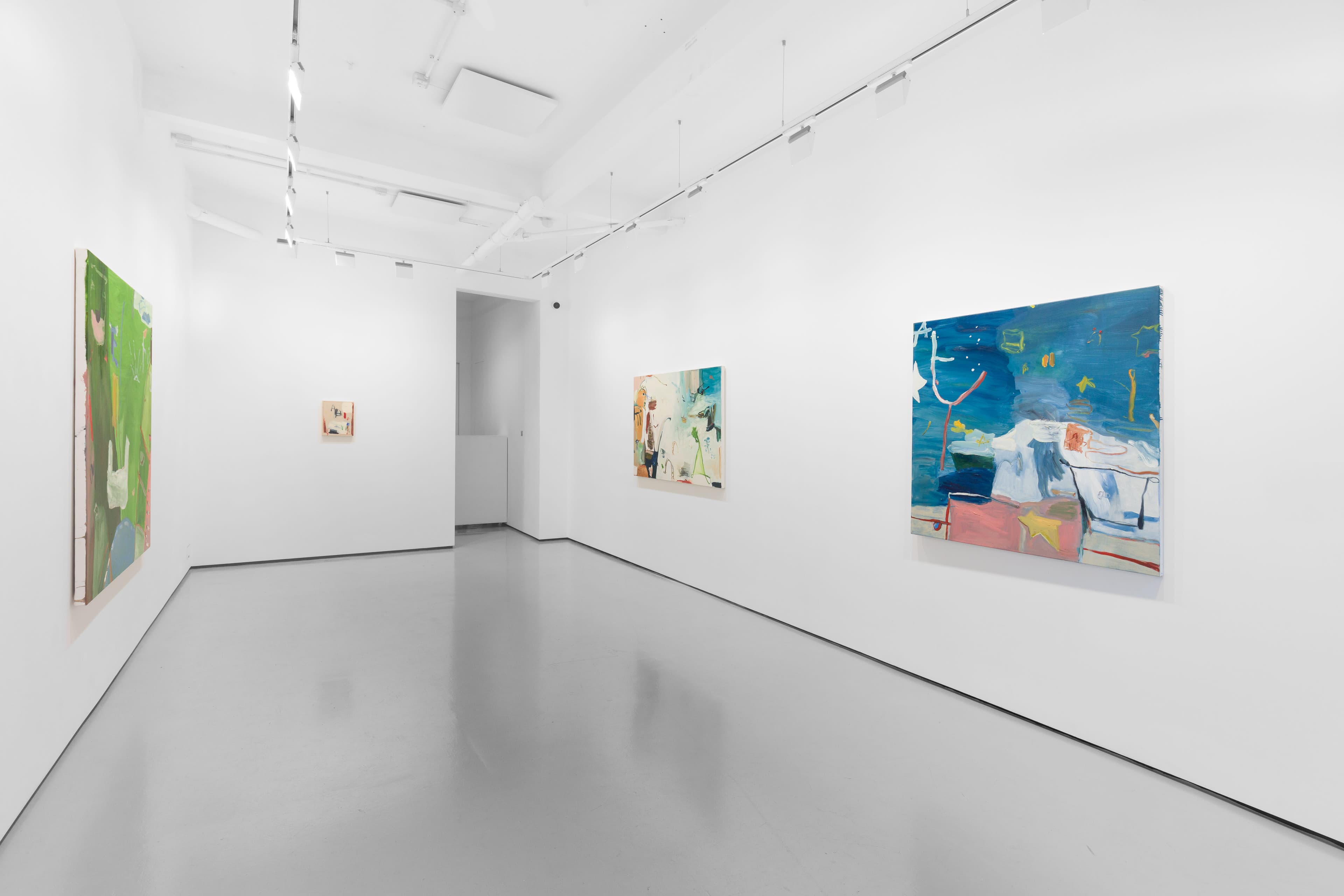 A white walled gallery with 4 artworks by b chehayeb hung on the walls