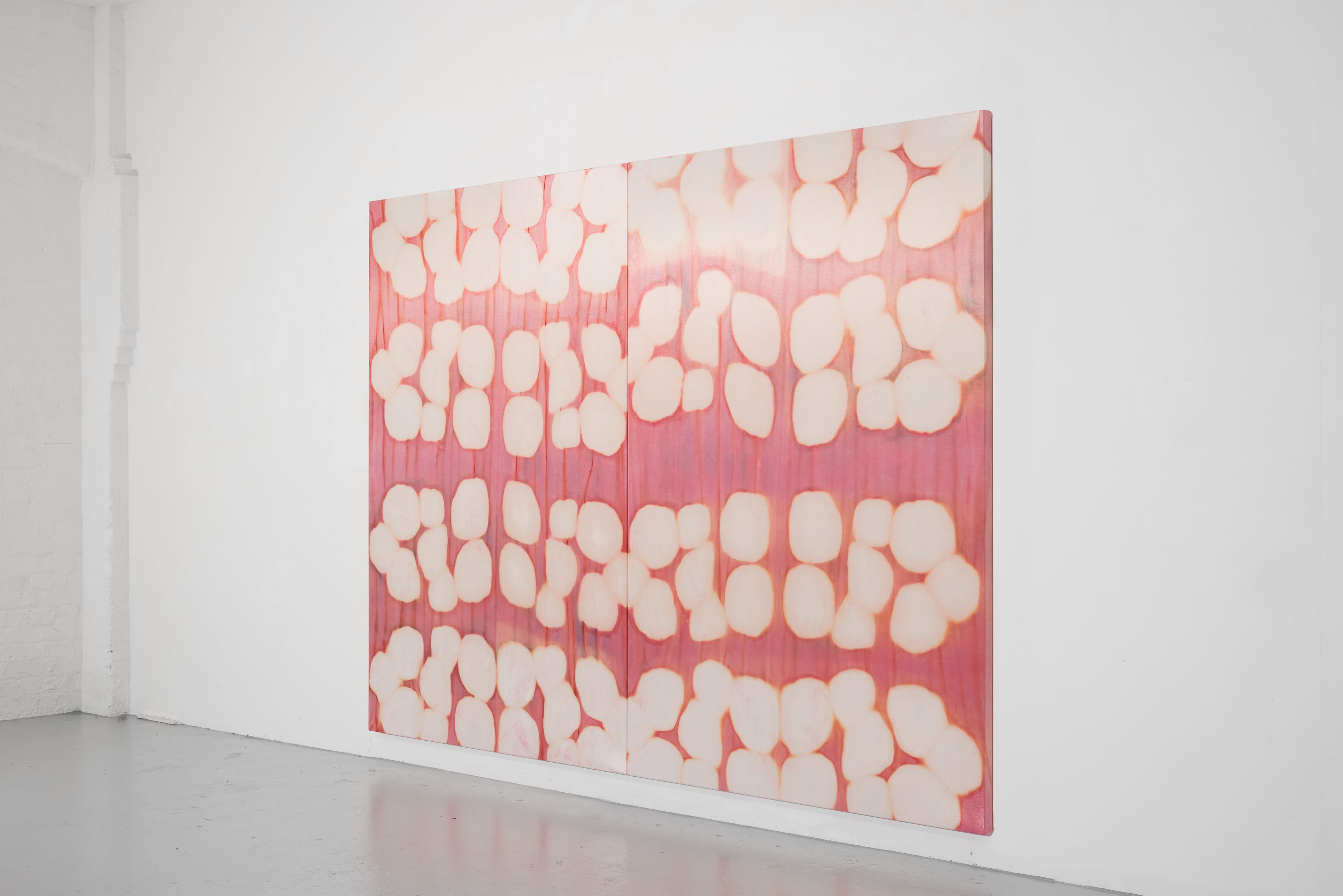 A large diptych painting by Max Boyla. Circular white forms on a pink background.