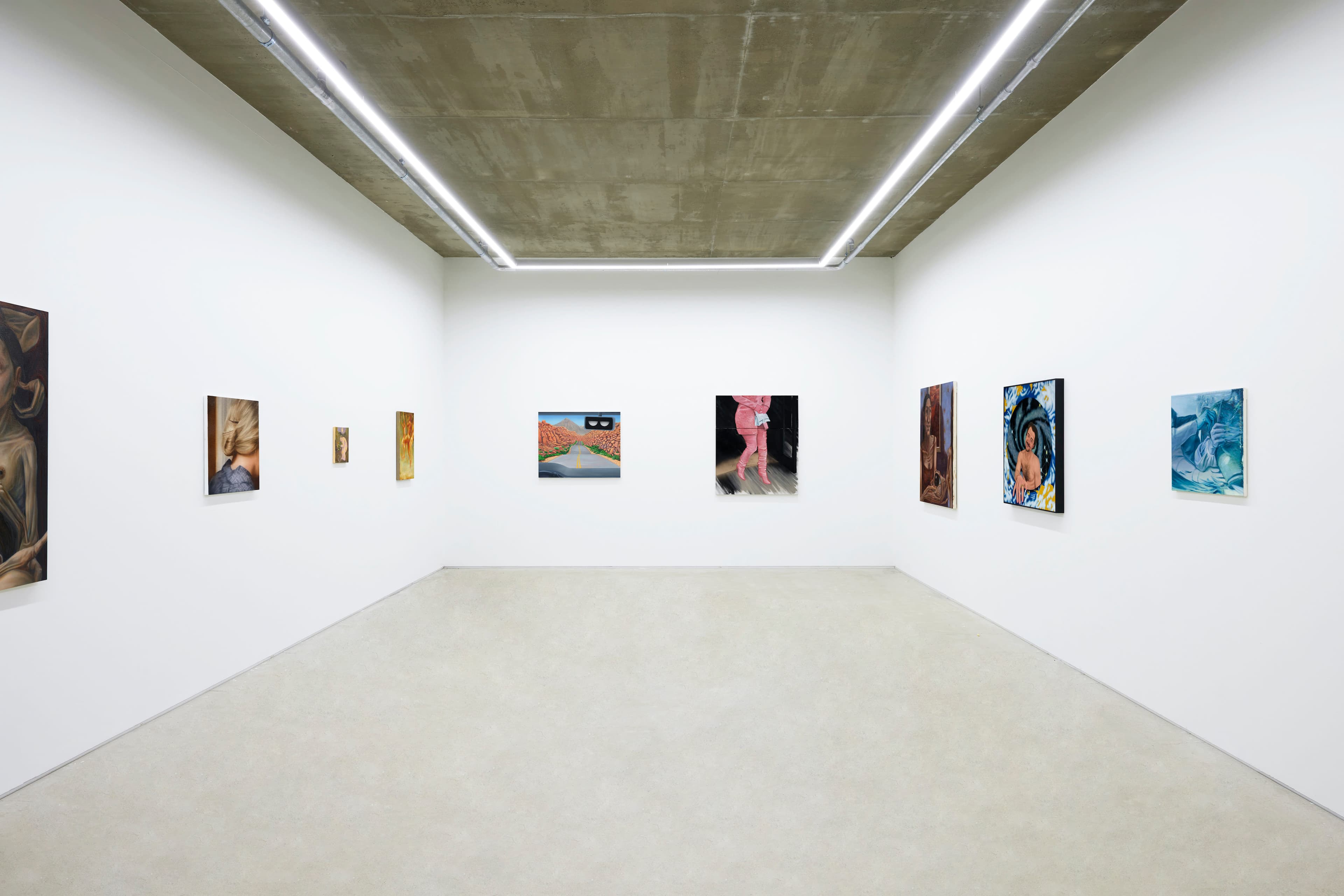 An installation view of a group painting exhibition including a painting by Rachel Lancaster