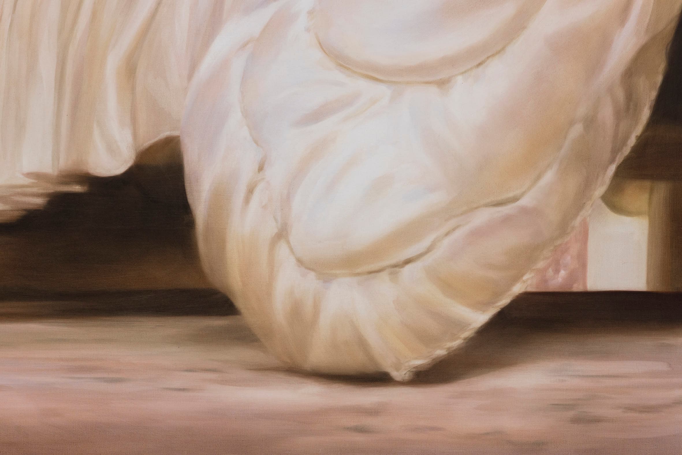 detail crop of a painting of an eiderdown touching the floor