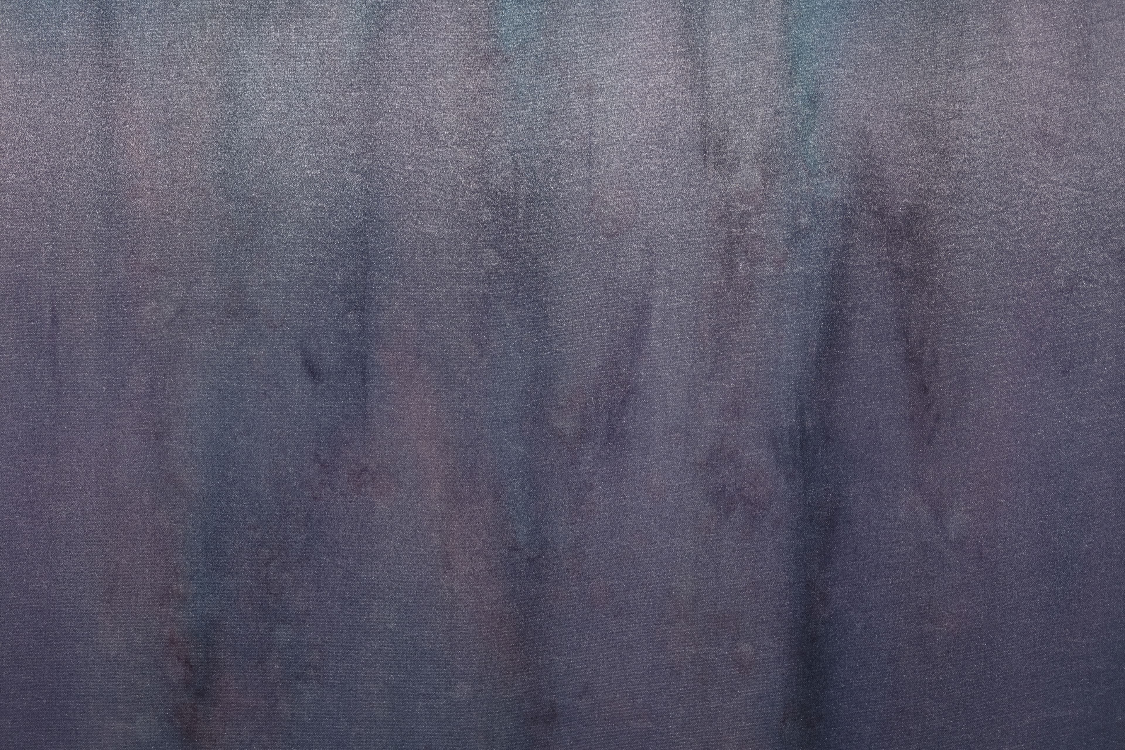 A large painting by Max Boyla. Dark purple background with a light bleached white and pink spot on the top of the canvas and lighter peach coloured markings on the bottom.