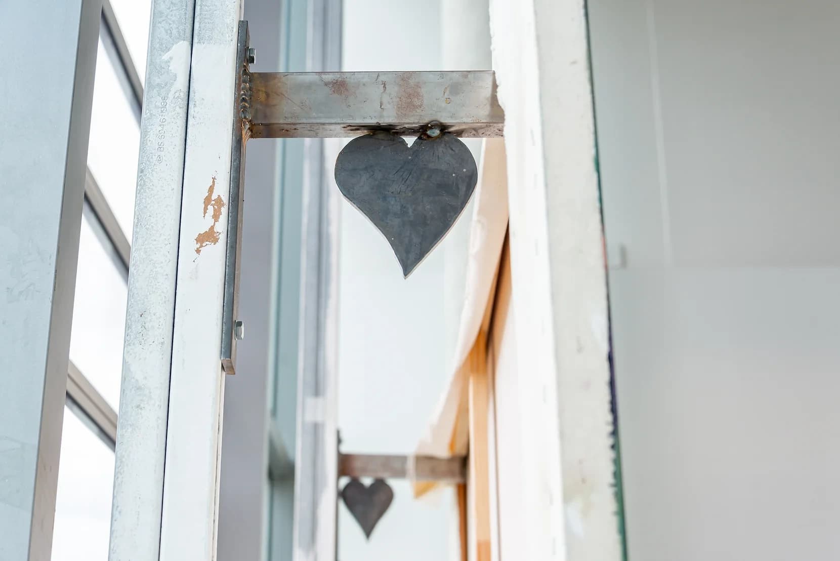 A heart shaped steel support for a painting by James Cabaniuk 