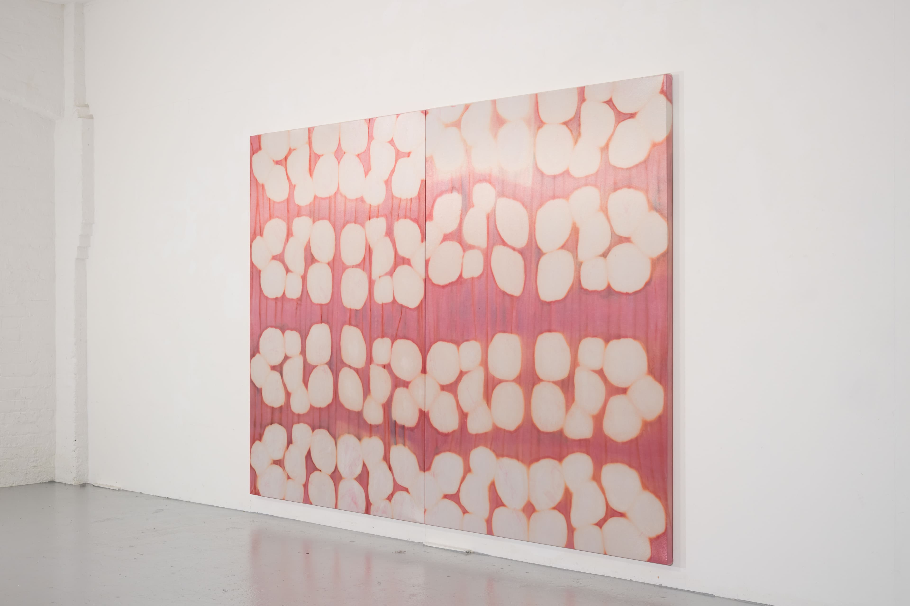 A large diptych painting by Max Boyla. Circular white forms on a pink background.