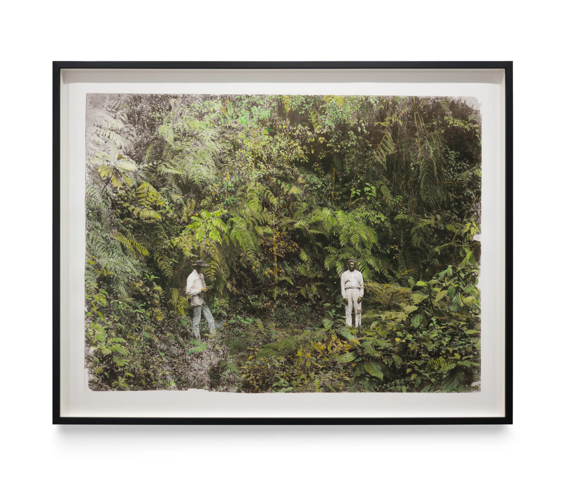 A hand painted found photograph by Ingrid Pollard