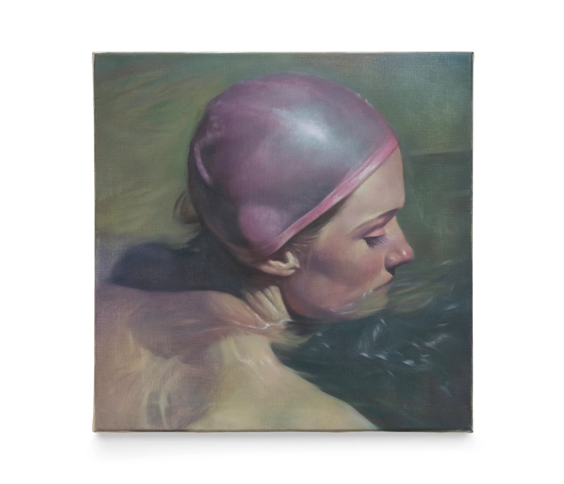 A portrait of a swimmer wearing a pink bathing hat